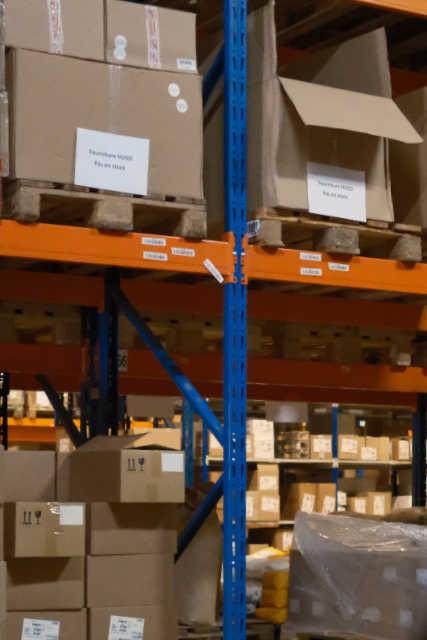 Pallets on a shelf in the warehouse.